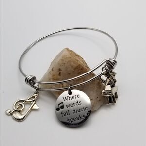 Where words fail music speaks silver tone bracelet quotations jewelry. B514